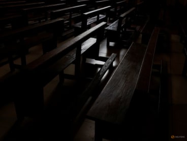 Empty pews are seen inside a Catholic church in Madrid, Spain, October 27, 2023.REUTERS/Susana Vera