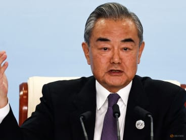 FILE PHOTO: Chinese Foreign Minister Wang Yi speaks at a press conference on the sidelines of the Third Belt and Road Forum (BRF), at the media centre in Beijing, China October 18, 2023. REUTERS/Tingshu Wang/File Photo
