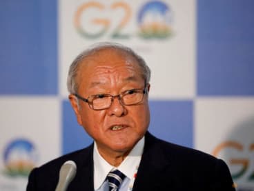 FILE PHOTO: Japanese Finance Minister Shunichi Suzuki speaks with the media after a meeting of G7 leaders on the sidelines of G20 finance ministers' and Central Bank governors' meeting at Gandhinagar, India, July 16, 2023. REUTERS/Amit Dave